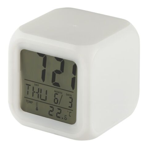 Reloj despertador con forma de dado.