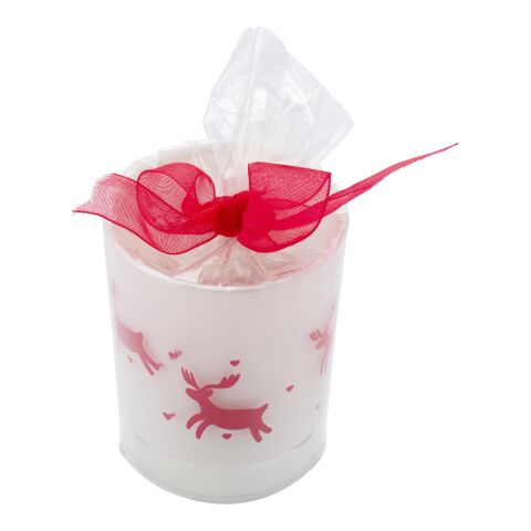 Vaso de cristal con vela y decorado navideño.