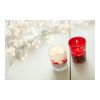 Vaso de cristal con vela y decorado navideño. rojo | sin montaje de publicidad