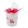 Vaso de cristal con vela y decorado navideño. rojo | sin montaje de publicidad