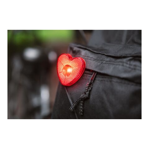 Luz intermitente, corazón rojo